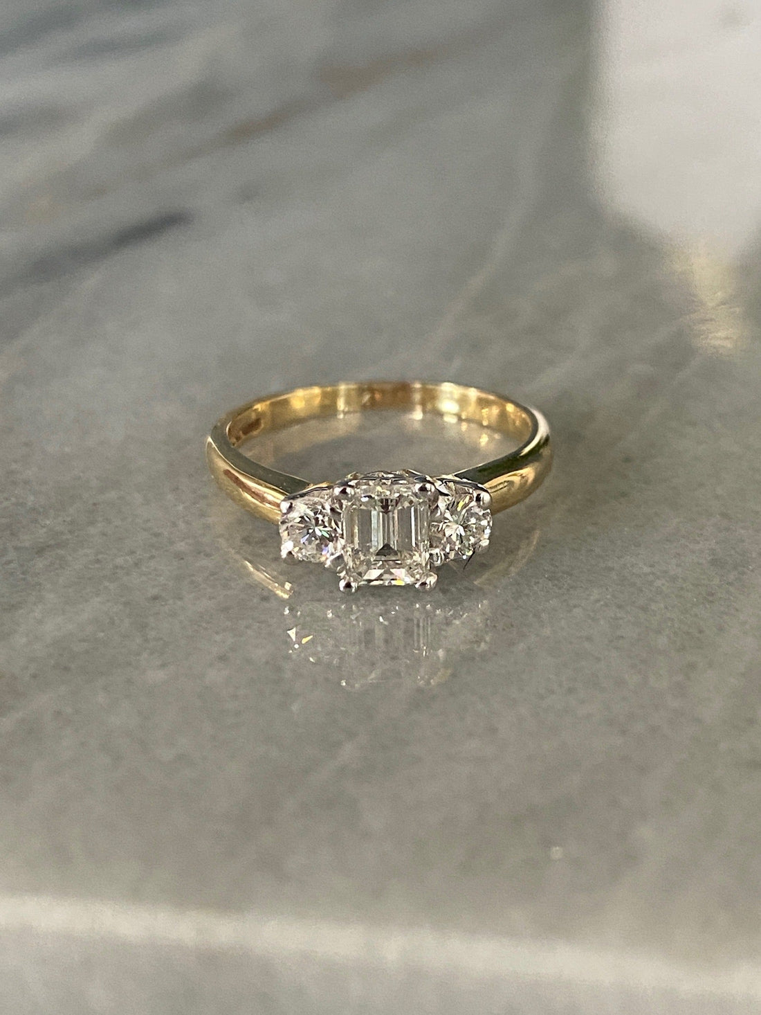 Yellow gold Engagement Ring with Emerald Cut & Round cut Diamonds