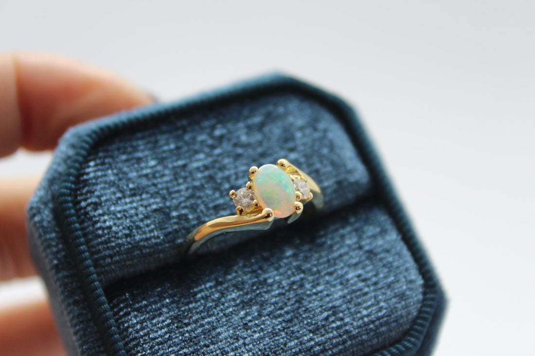 18ct Yellow gold engagement ring with opal and diamonds